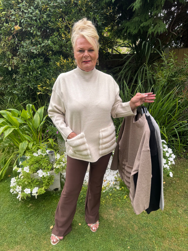 Faux fur pocket jumper