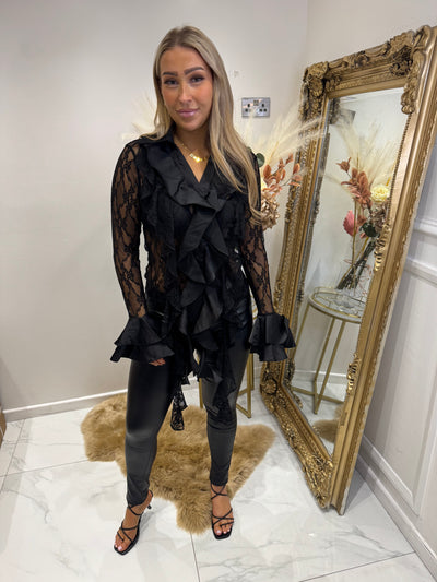 Black ruffle shirt