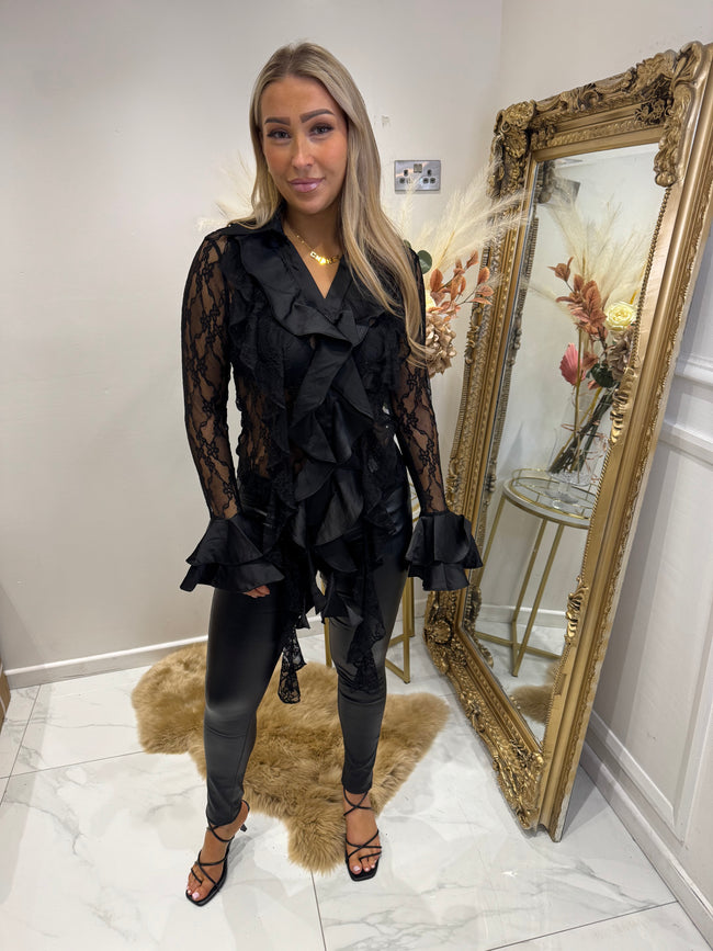 Black ruffle shirt